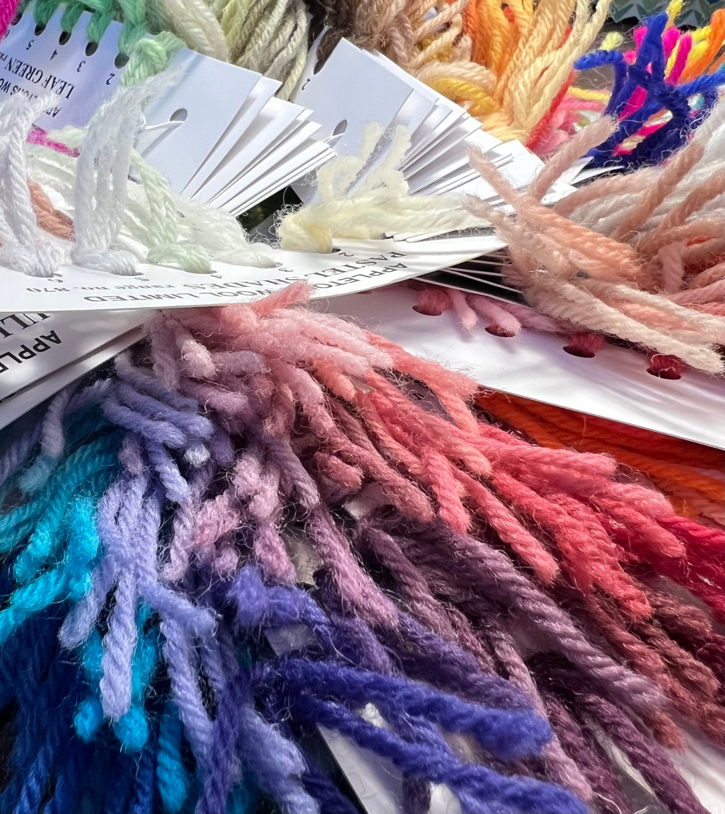 A rainbow of Appleton Wool tapestry yarn swatches